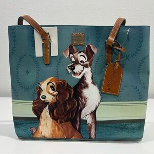 Brand new Disney Dooney and Bourke lady and the tramp tote new with tags.